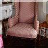 F54. Pink and blue Queen Anne style wingback chair. 
